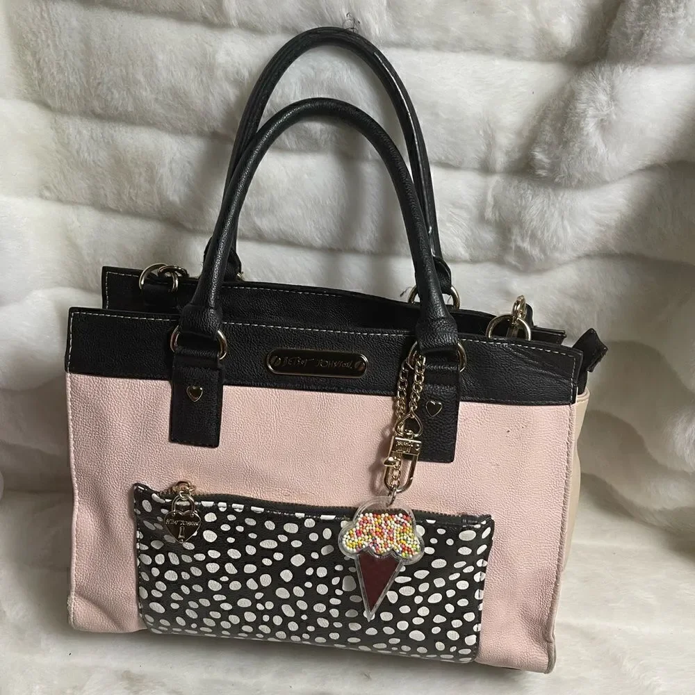 Betsey Johnson vegan leather pink & beige with black & white pocket,black straps